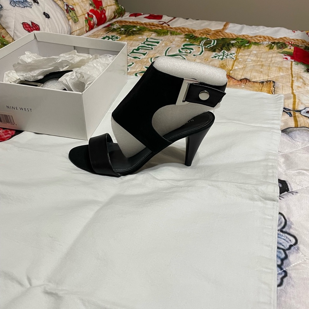 Nine West open-toed ankle boots.